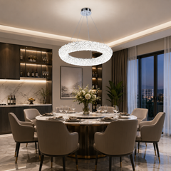 Candelabru LED 5558-500 CR suspendat deasupra mesei intr-o sufragerie moderna, design circular din cristal si iluminare LED alba