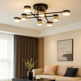 Lustra LED moderna cu 8 brate black-gold in living spatios, iluminare reglabila 3000–6500K cu telecomanda.