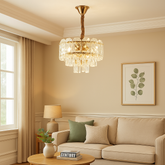 Candelabru modern auriu cu cristale 98046/300FG si 3 surse E27, ideal pentru living elegant cu iluminare calda si design compact premium.