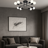 Lustra LED 9855-8 negru mat cu design geometric si 8 brate E27, iluminand un living modern cu stil minimalist.