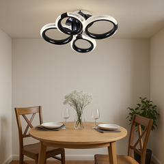 Lustra LED P011-2+2 cu patru cercuri decorative si lumina reglabila 3000–6500K, controlata cu telecomanda, amplasata in dining modern.