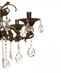 Candelabru rotund auriu cu cristale lacrima deasupra mesei in dining elegant, 6 brate E14, lumina calda, stil regal