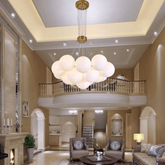 Lustra LED auriu mat 14 globuri sticla mata, iluminare eleganta pentru living spatios