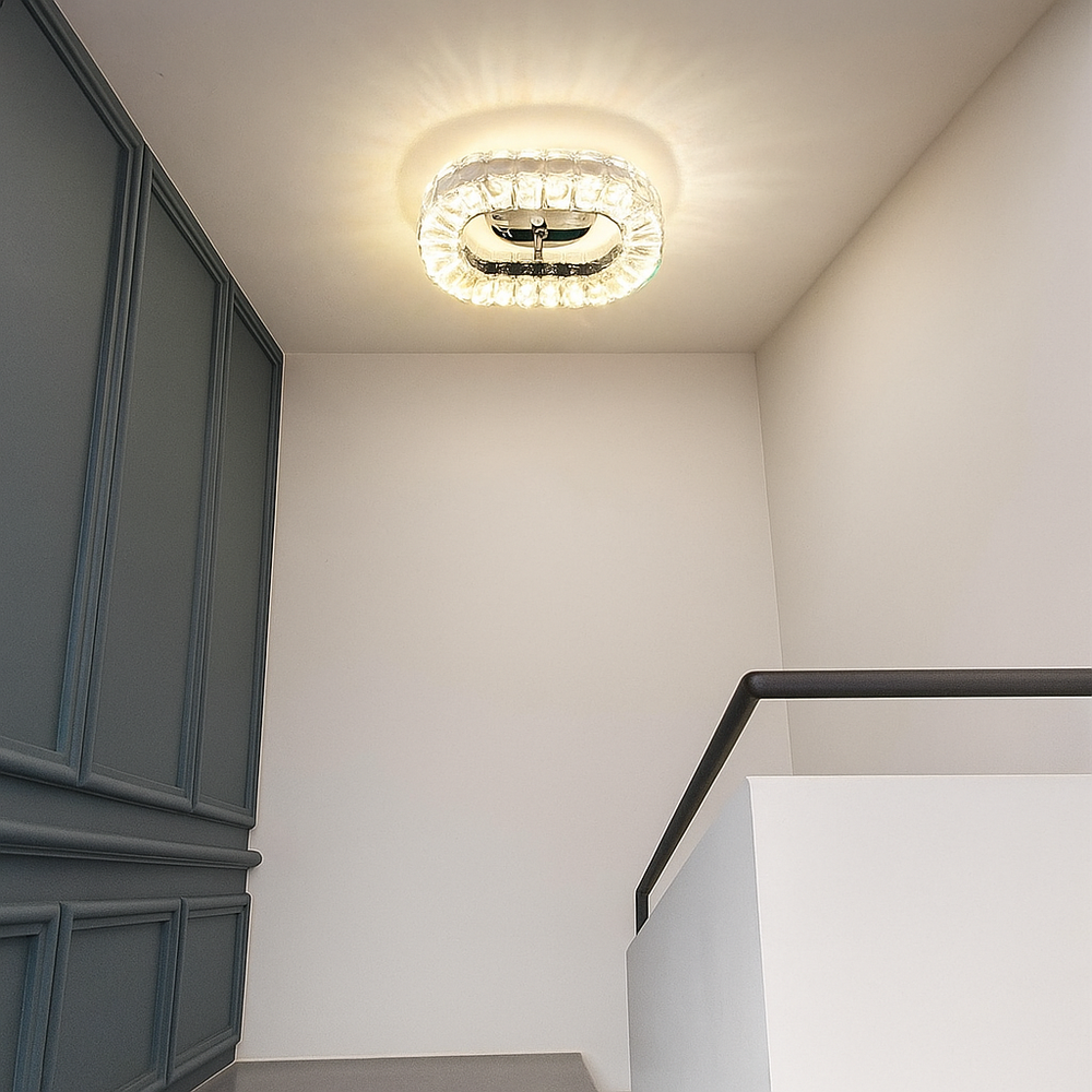 Lustra LED ovala 46W alba cu telecomanda si lumina reglabila 3500K-6500K, montata in zona de scari pentru iluminare moderna si uniforma