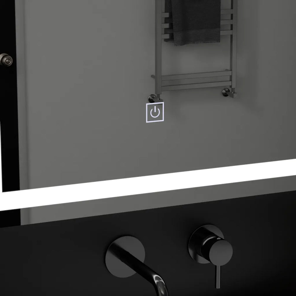 Oglinda LED 50x70 cm cu touch si contur luminos rece, design modern pentru baie si spatii contemporane.
