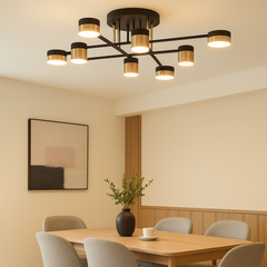 Lustra LED cu 8 brate black-gold in zona de dining, lumina ajustabila si control prin telecomanda pentru atmosferaa ideala.