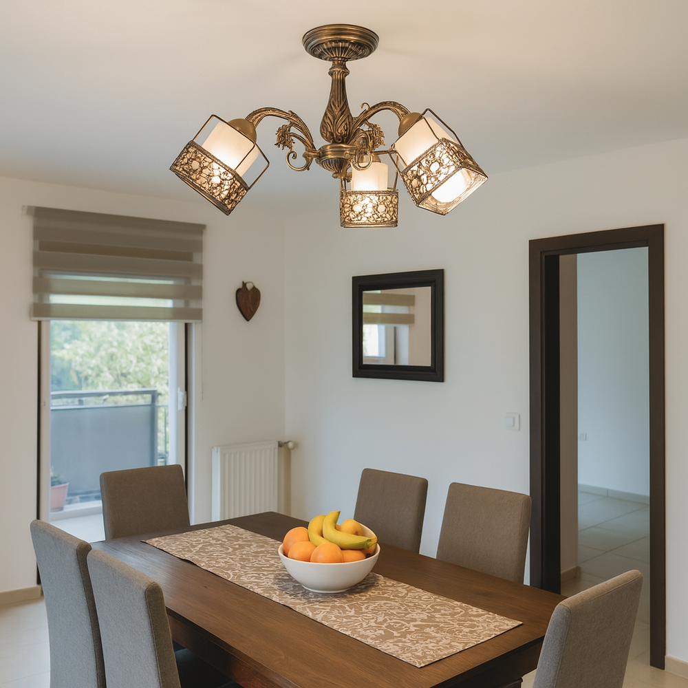 Candelabru vintage cu 3 brate bronz antic lumineaza masa de dining, oferind un efect cald si decorativ ideal pentru interioare clasice.