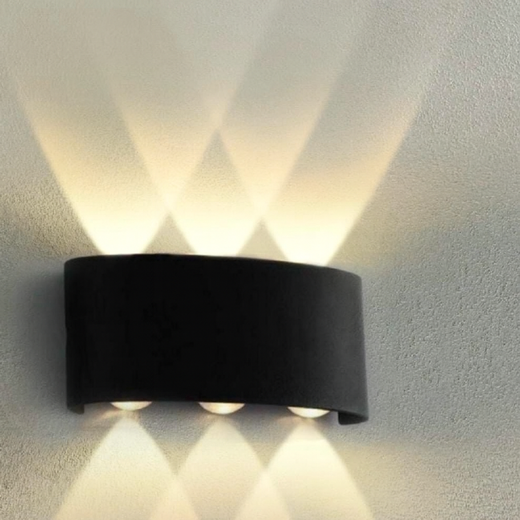 Aplica LED 6W cu lumina calda si efect in X, finisaj negru, perfectă pentru holuri moderne si accente decorative.