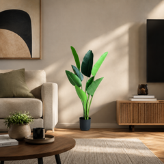 Plantă artificială Strelitzia Nicolai verde, 120 cm, cu frunze tropicale mari și aspect realist, în ghiveci negru, ideală pentru living, dormitor, birou, recepție, hotel, restaurant, cafenea și spații comerciale.
