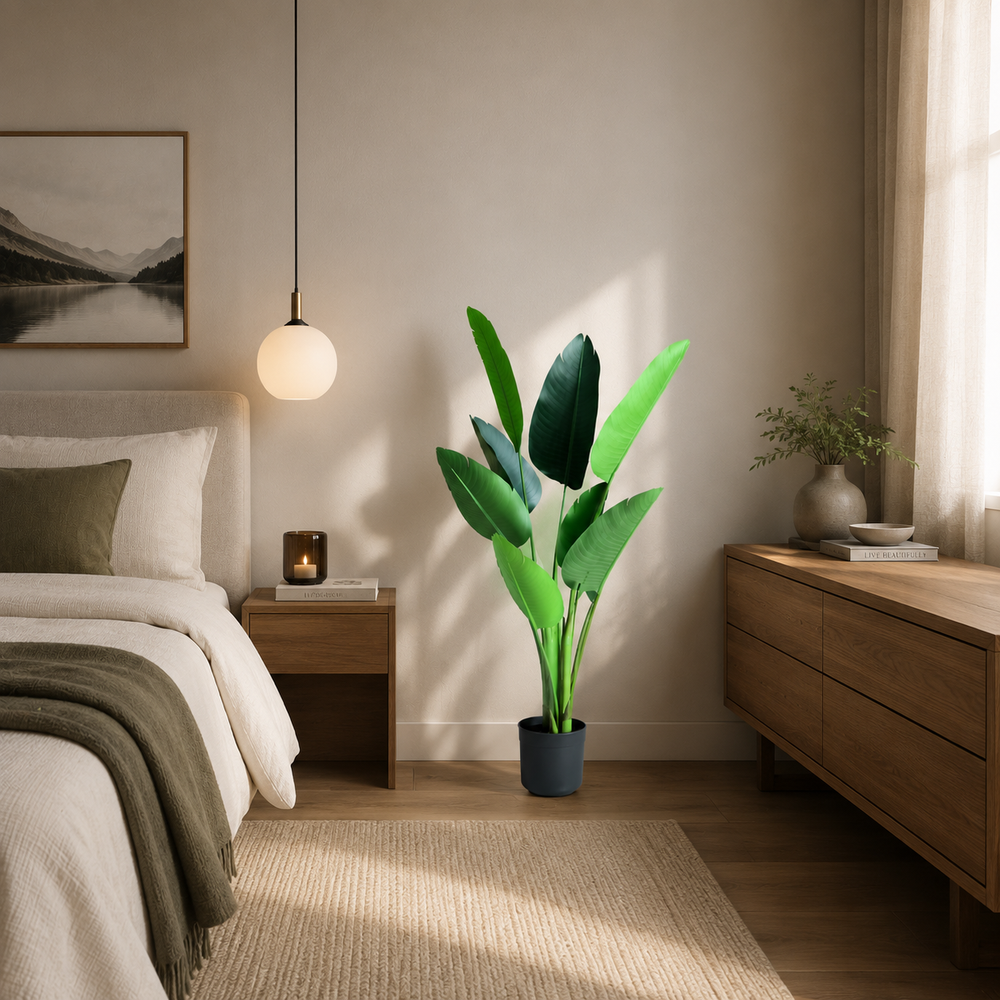 Plantă artificială Strelitzia Nicolai verde, 120 cm, cu frunze tropicale mari și aspect realist, în ghiveci negru, ideală pentru living, dormitor, birou, recepție, hotel, restaurant, cafenea și spații comerciale.