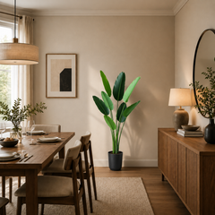 Plantă artificială Strelitzia Nicolai verde, 150 cm, cu frunze tropicale mari și aspect realist, în ghiveci negru, ideală pentru living, birou, hotel, restaurant, recepție și spații comerciale.