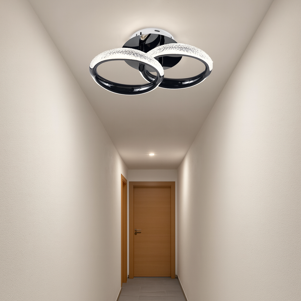 Lustra LED P011-2 cu doua cercuri si lumina ajustabila, controlata prin telecomanda, montata pe un hol modern luminat uniform.
