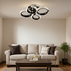 Lustra LED P011-2+2 cu patru cercuri decorative si finisaj negru lucios, lumina reglabila si telecomanda, iluminand un living modern.
