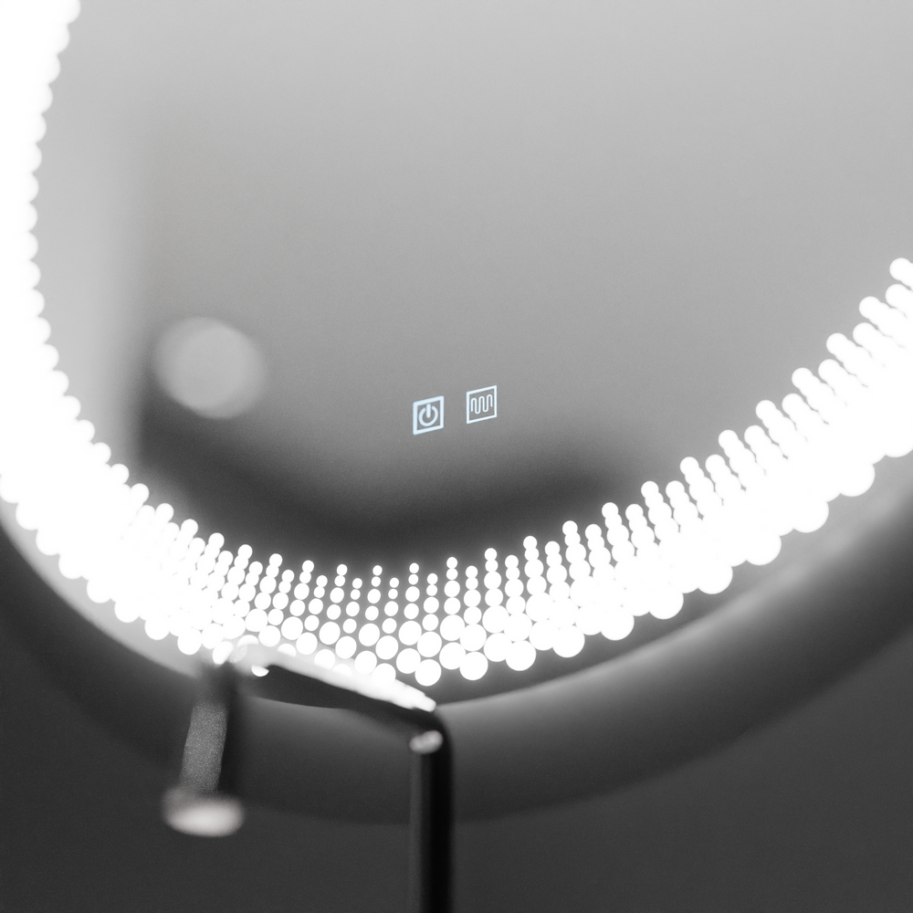 Oglinda LED rotunda 60x60 cm cu lumina reglabila, control touch si functie de dezaburire, ideala pentru bai moderne.
