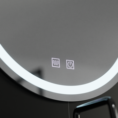 Oglinda LED rotunda 70 cm cu lumina reglabila, control tactil si sistem de dezaburire pentru bai moderne.
