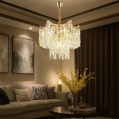 Candelabru rotund auriu 5520/400FG cu elemente transparente in living modern, lumina calda, montaj pe tavan, iluminare eleganta fara telecomanda